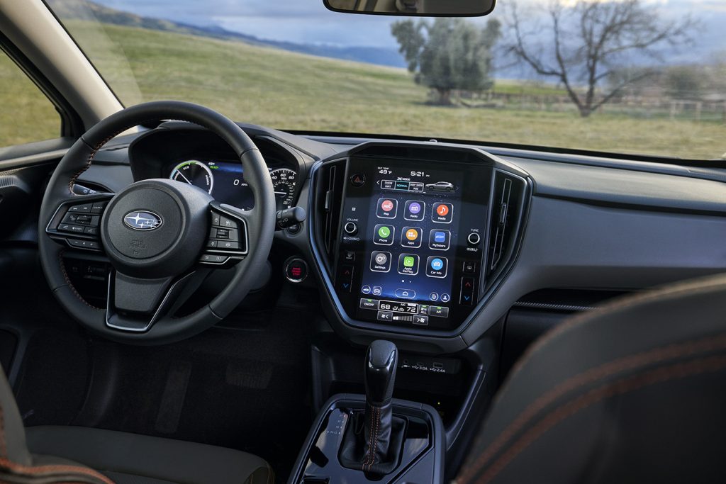 Interior of the Subaru Crosstrek Hybrid featuring touchscreen infotainment system and driver-focused cockpit
