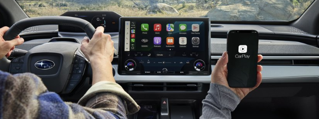 Detail Interior with mutlimedia screen. Talent driving in mountains