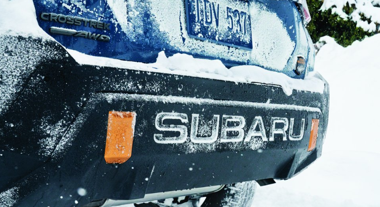Close-up detail shot of Crosstrek Wilderness in snow. *Carryover MY24 Usage available for all content purposes. Expires 6.7.28