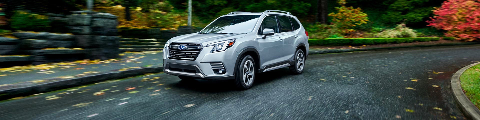 A 2022 Forester driving on a highway. | All American Subaru of Old Bridge in Old Bridge NJ