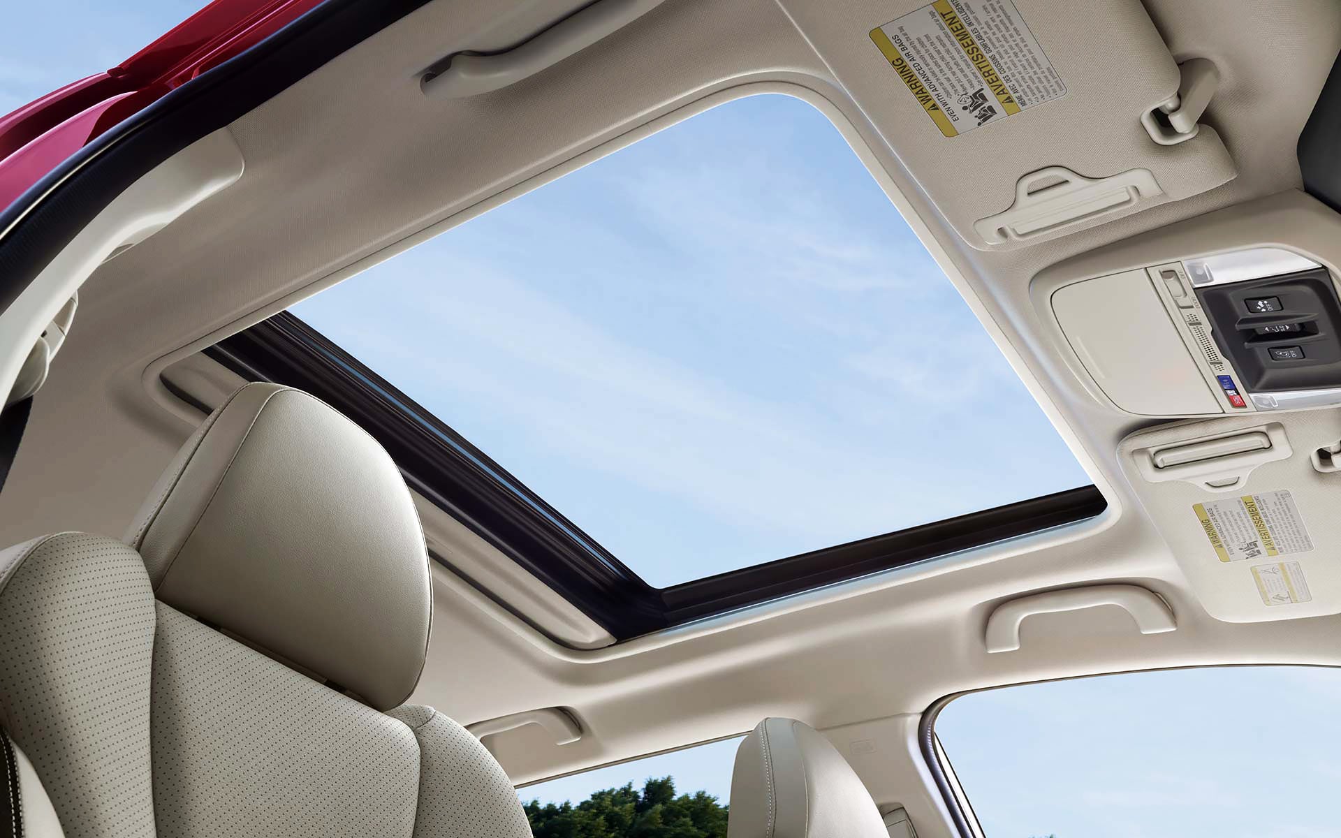 A view through the power sliding panoramic moonroof on the 2022 Forester Sport. | All American Subaru of Old Bridge in Old Bridge NJ