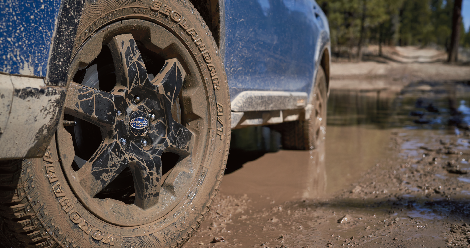 A close-up of the 17-inch off-road wheels and all-terrain Yokohama GEOLANDAR® tires on the 2023 Outback Wilderness. | All American Subaru of Old Bridge in Old Bridge NJ